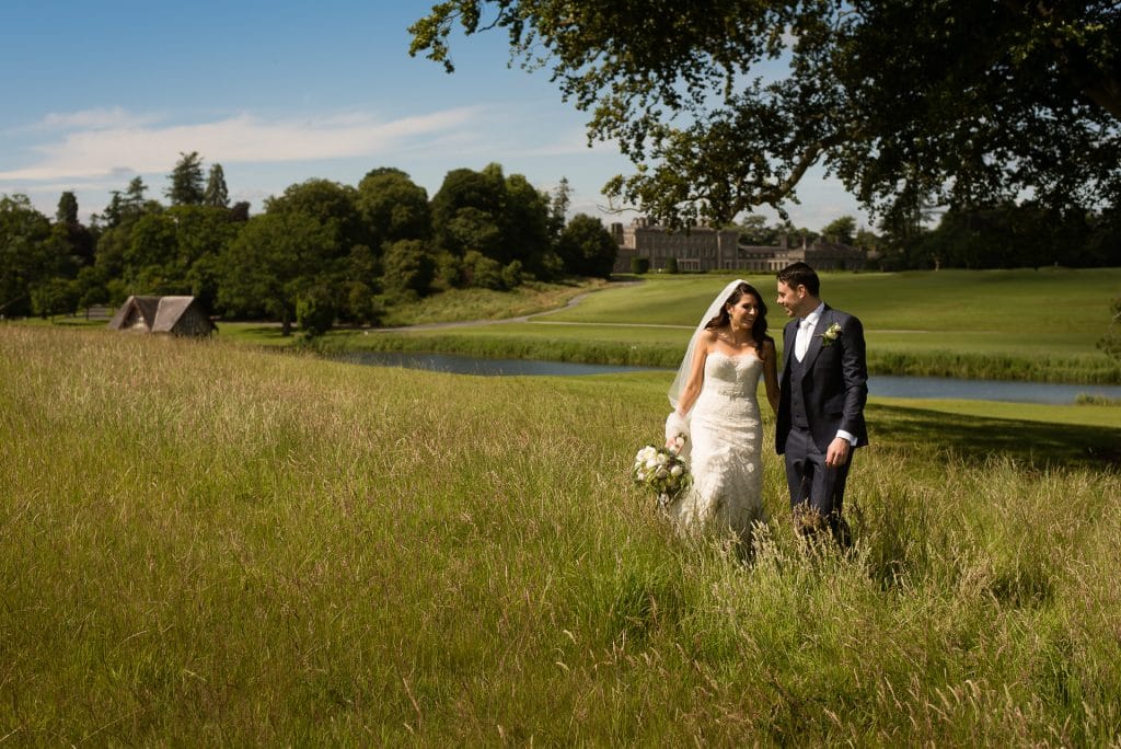 Wedding couple walking in Carton House grounds